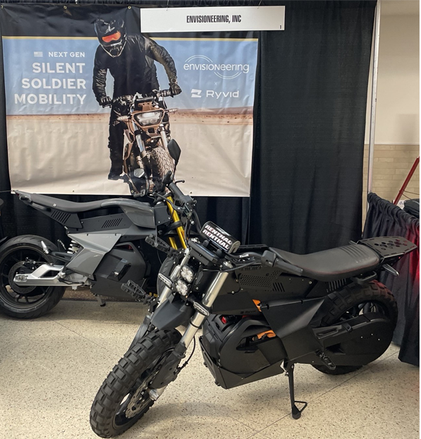 a motorcycle parked in front of a sign